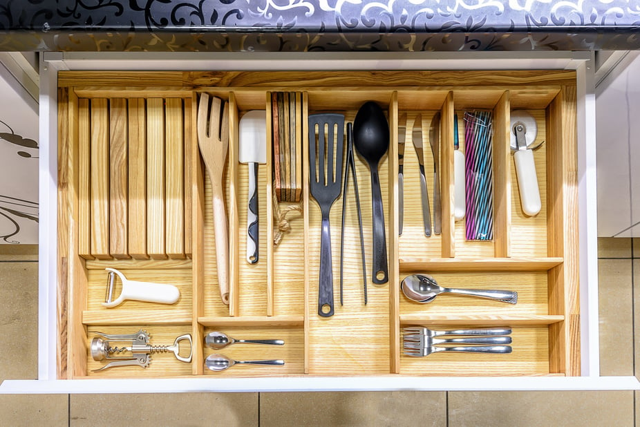 Opened kitchen drawer , a smart solution for kitchen storage and organizing